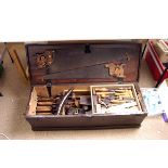 A cabinet maker's tool chest,  containing planes, saws, chisels and various other tools, 96 x 32 x