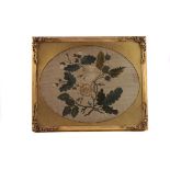 A 19th century silk embroidery, of thistles and roses entwined 42cm x 33cm, framed and glazed with