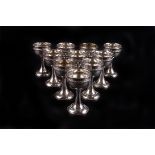 A set of French silver kiddush cups,  each decorated with a raised foliate band, approx. 6ozt gross