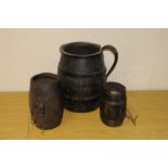 Three interesting antique barrels, including two small powder barrels and a large coopered jug (3)