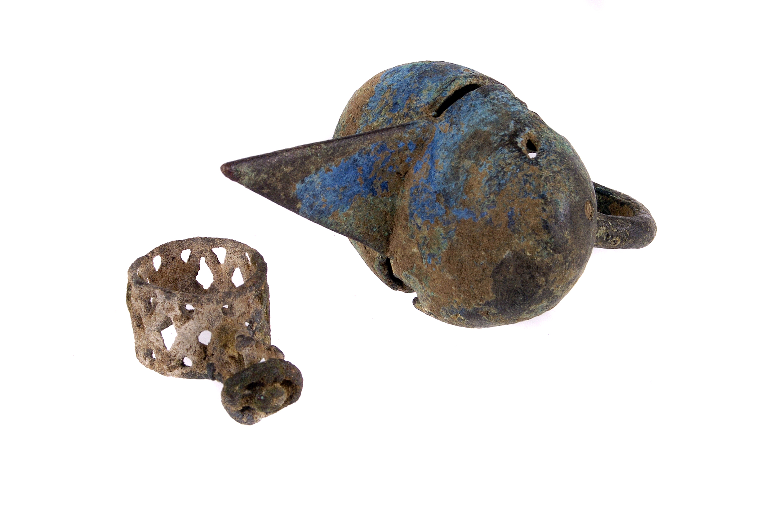 Two Malian copper alloy Dogon rings, one as a disk and cage on trellis shank, the other as a slotted
