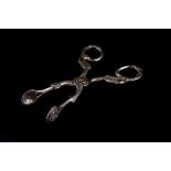 A pair of Victorian sugar tongs, London 1851, with scrolling vine handles, 1.5ozt.