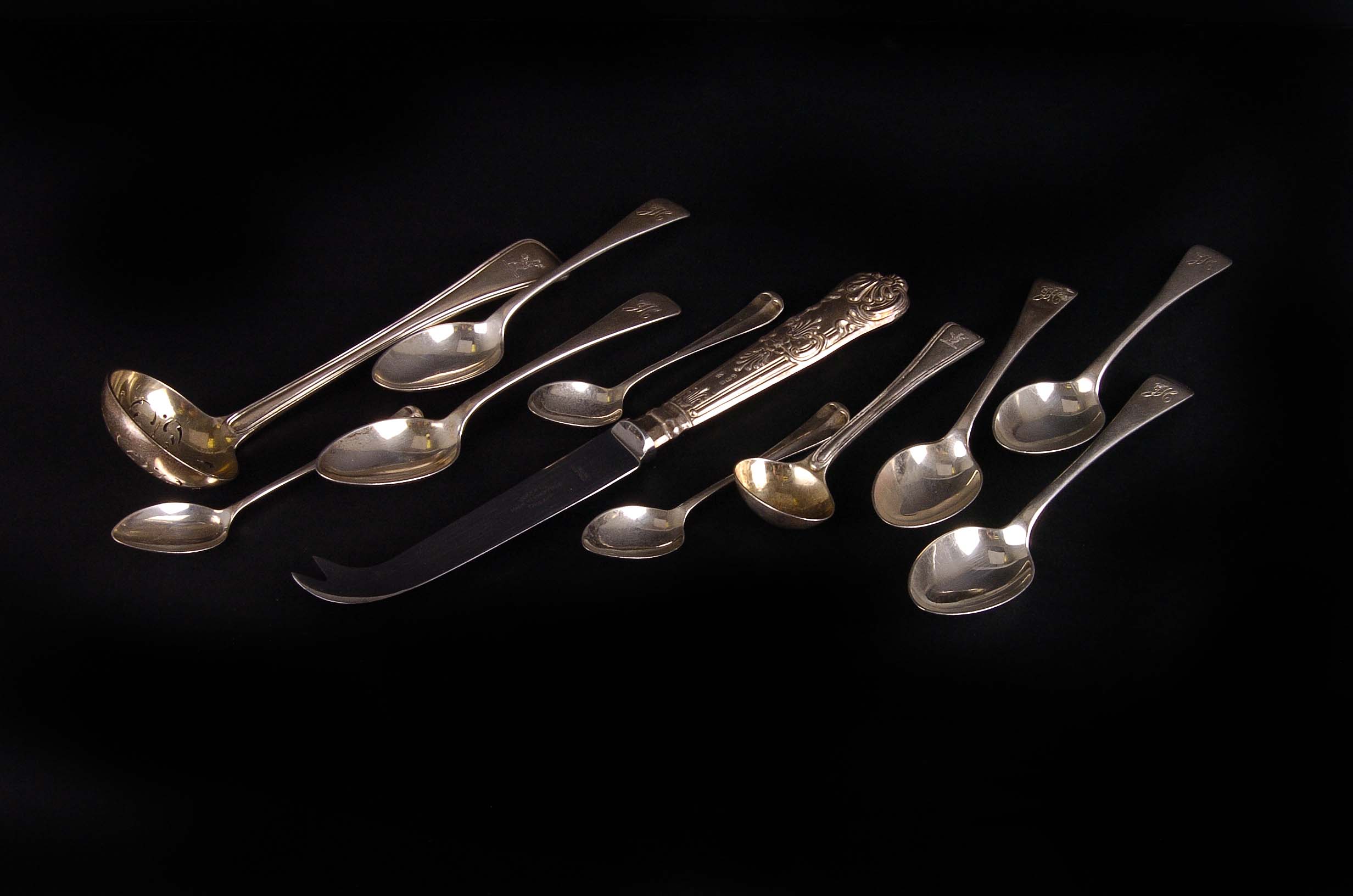 A cased set of silver and enamel tea spoons, plus another cased set, two loose sets, and four