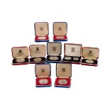 A collection of fourteen UK and other silver proof coins, including four Royal Mint 1977 crowns,