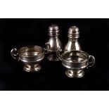 A pair of Edward VII silver vase salts, with clear glass liners, London 1907 by William Comyns &