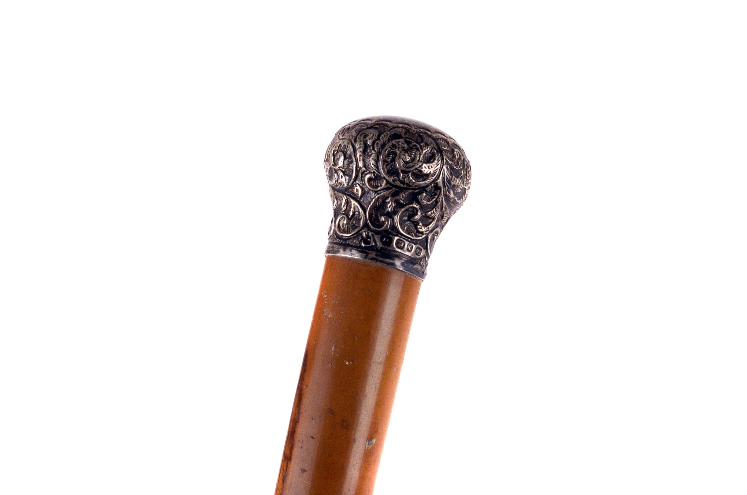 A silver mounted Malacca cane, Birmingham 1894, monogrammed JM