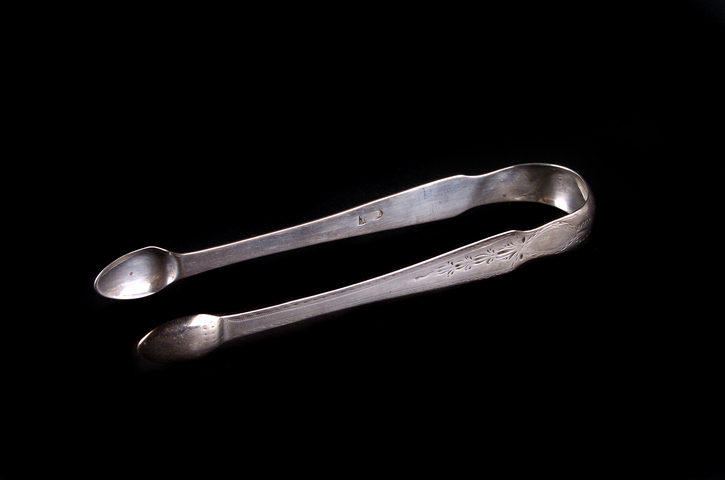 A pair of George III Newcastle silver sugar nips, possibly by Thomas Watson (mark obscured),