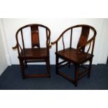 A pair of Chinese Qing dynasty elm horseshoe chairs, with brass encased cogged scarf joints, and a