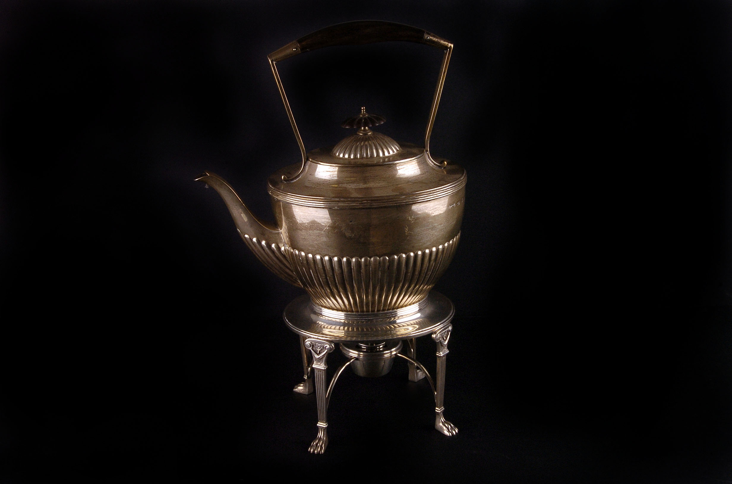 A Victorian silver kettle on stand by Elkington & Co, the traditional oval form kettle with