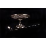 A George V reticulated silver tazza, London 1913 by Carrington & Co., plus a baleen handled punch