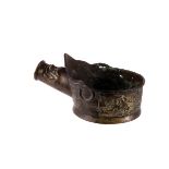 A 19th century Chinese brass vessel, thought to be a grain or water scoop, decorated with a mask