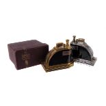 Two Art Deco ‘Touch-Tip’ table lighters, by Ronson, in chrome and black, and gilt and deep maroon,