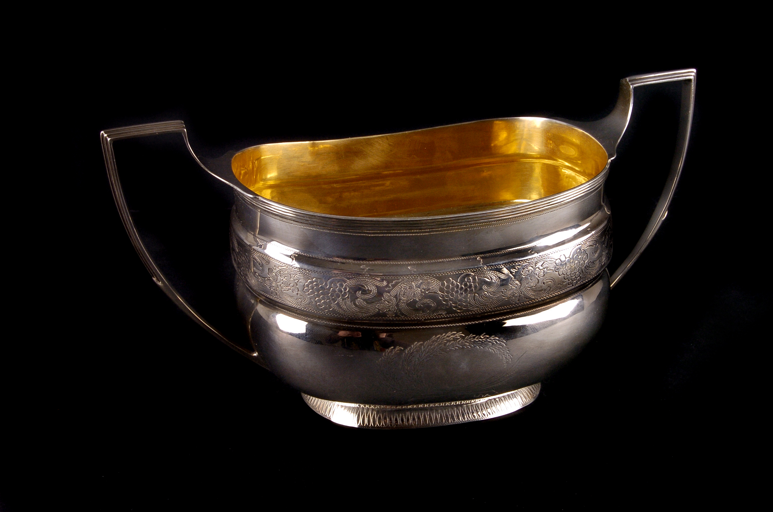 A George III Newcastle silver twin handled sugar basin by Robertson II & Watson, the ovoid