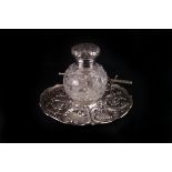 A fine Victorian silver and cut glass inkwell on stand by Charles Boyton, the circular embossed