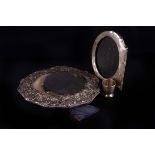 A silver mirror, picture frame, egg cup, and spoon (4)