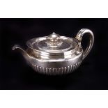 A Georgian silver tea pot, London 1804 by Thomas Ellerton & Richard Sibley I, with later handle