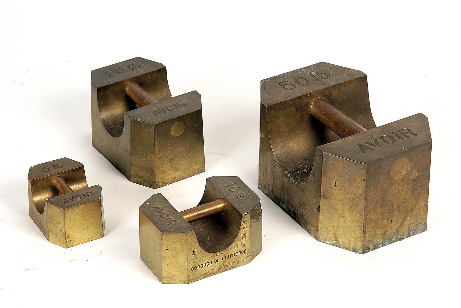 Brass Weights with cylindrical inset handle to top and canted corners for Borough of Clitheroe, cast