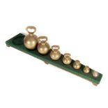 A part-set of brass Spherical Weights for Borough of Grantham, lbs - 56, 28, 14, 7, 4, 2 and 1, on