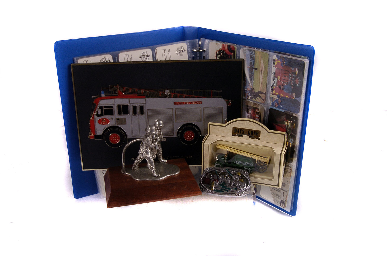 A selection of Fire Service related ephemera, to include trade cards, dish cloths, plaques, figures,