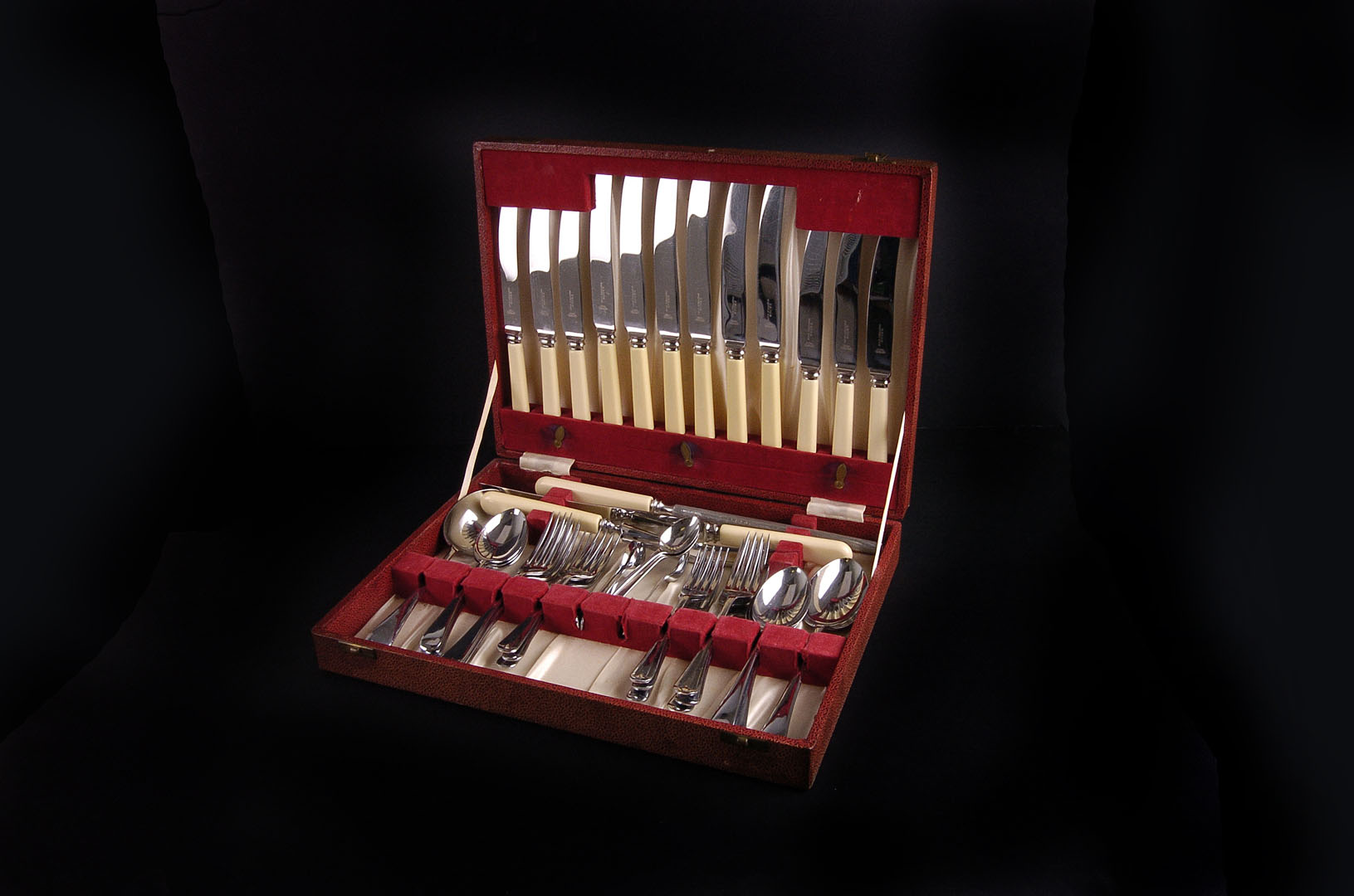 An electroplated six piece dinner service by Redge, Sheffield,  in a leather bound canteen, together