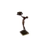 An Art Deco spelter lamp base,  modelled as a female dance, with fitting, badly damaged and repaired