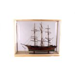 A cased WWII PoW model of a 19thC clipper-type ship:  well-constructed from salvaged wood & scrap