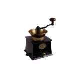 A late Victorian brass and cast iron coffee mill by A. Kendrick & Sons,  16cm high