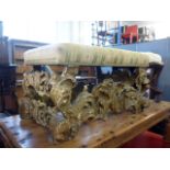 A baroque gesso and gilt upholstered stool, with striped silk cover 80cm W missing gesso and gilt