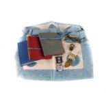 A selection of various Masonic items, to include aprons, jewels, books and more (parcel)