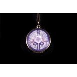 A modern enamel locket pendant by Michael Fray,  circular with printed bird and floral design,