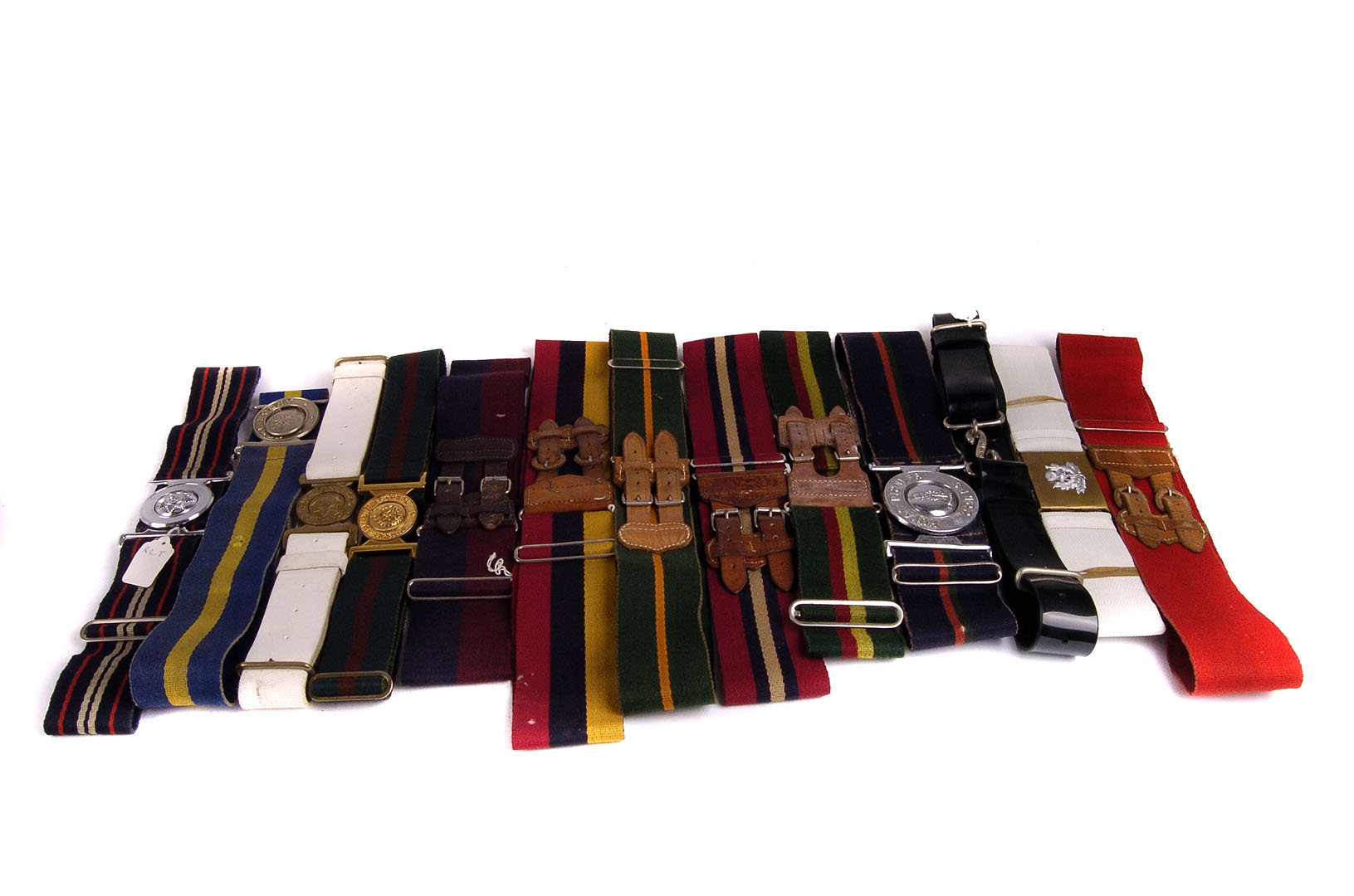 An assortment of thirteen stable belts, including Army Apprentices School Arborfield, Irish