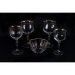 A fine suite of early 20th century hand-blown glasses,  each with flat gilt edges, comprising