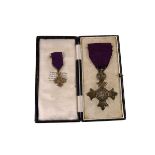 A cased civil O.B.E medal and miniature, possible awarded to Theodore Chambers