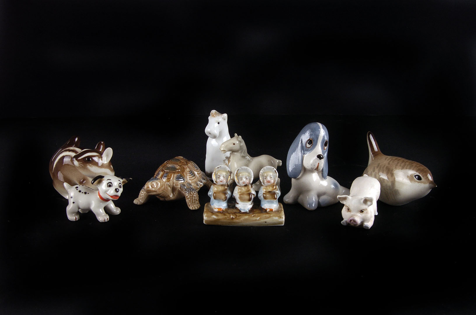 A collection of Wade Whimsie figures,  and others in the style of, together with a Black Forest