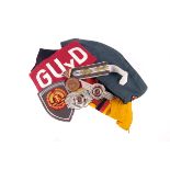 A collection of East German and Russian military items, to include arm bands, badges, buttons,