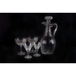 A collection of glass ware,  including a decanter, a suite of wine glasses, two bowls and a small