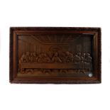 A framed cast iron plaque,  depicting da Vinci's 'Last Supper', 62 x 34cm