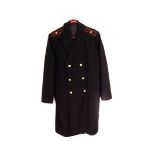 A Russian Naval full length overcoat, having black with double red strip and sink star shoulder