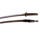 An African tribal sword, having engraved marking to the blade, with leather and reed decorated