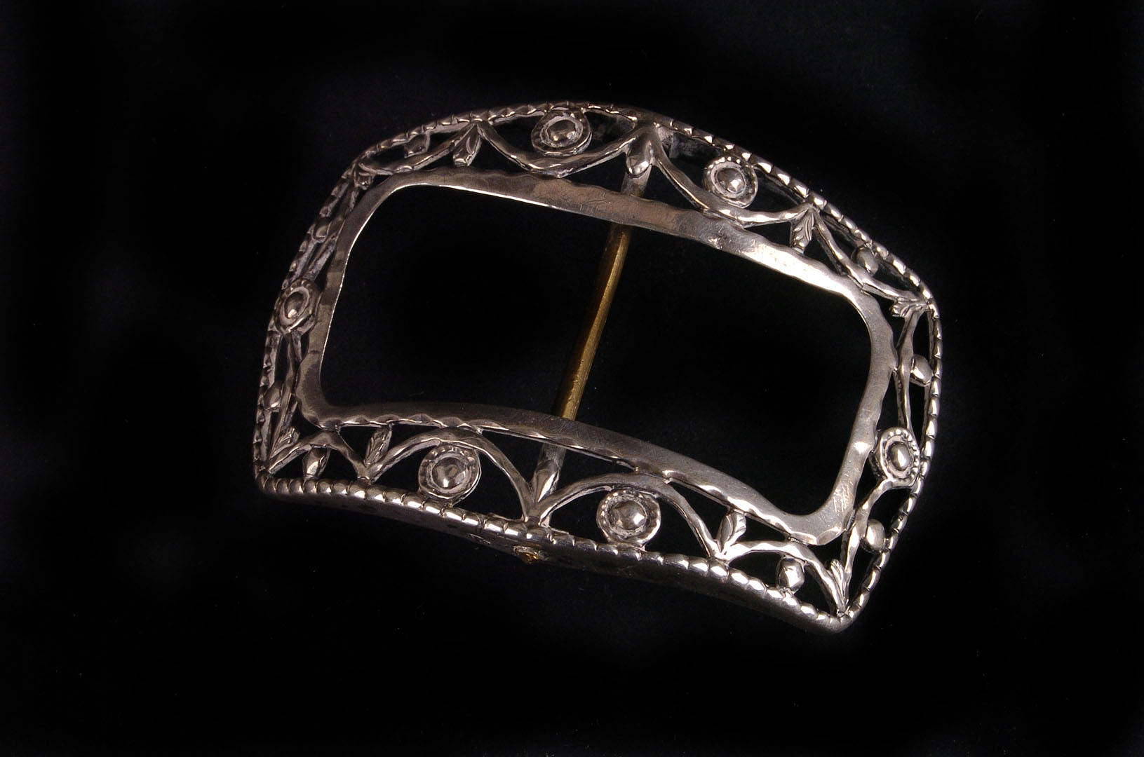 A George III silver buckle,  possibly William Stroud, Sheffield 1815, with open work swag and