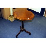 A William IV and later occasional table, the tripod pedestal rosewood and brass base supporting a