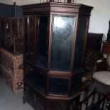 An Edwardian mahogany display cabinet,  with bevelled glass and open gallery to the base, 158.5cm