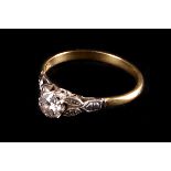 An Art Deco single stone diamond ring,  the central brilliant approx. .25 carat, to illusion cut