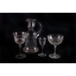 A suite of early 20th century wine glasses,  with finely cut design, together with two matching