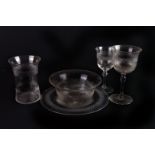 A suite of cut glass,  to include sundae dishes and stands, water beakers, wine and sherry