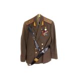 A Russian Major General's uniform, comprising jacket, with a Russian medal and a quantity of
