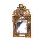 A 19th century wall mirror,  the rectangular distressed glass within a painted and gilt wooden