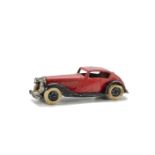 A Pre-War Dinky Toys 24e Super Streamlined Saloon, red body, black type 1 criss-cross chassis,