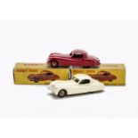 A Dinky Toys 157 Jaguar XK120 Coupe, red body, red hubs, in original box, E, box P-F, another with