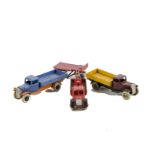 A Pre-War Dinky Toys 25e Tipping Wagon, type 1, black open chassis, maroon cab, yellow tipper,